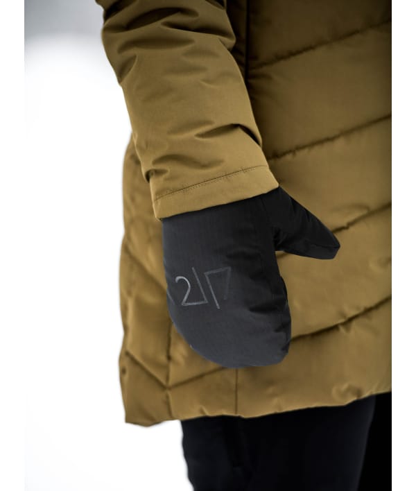 Women wearing mitten ski gloves in snow
