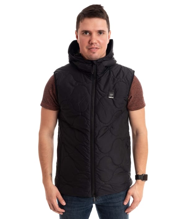 man wearing black light padded vest