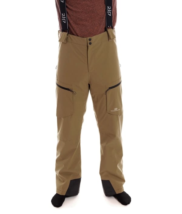 man wearing gold brown light padded ski pants 1 2