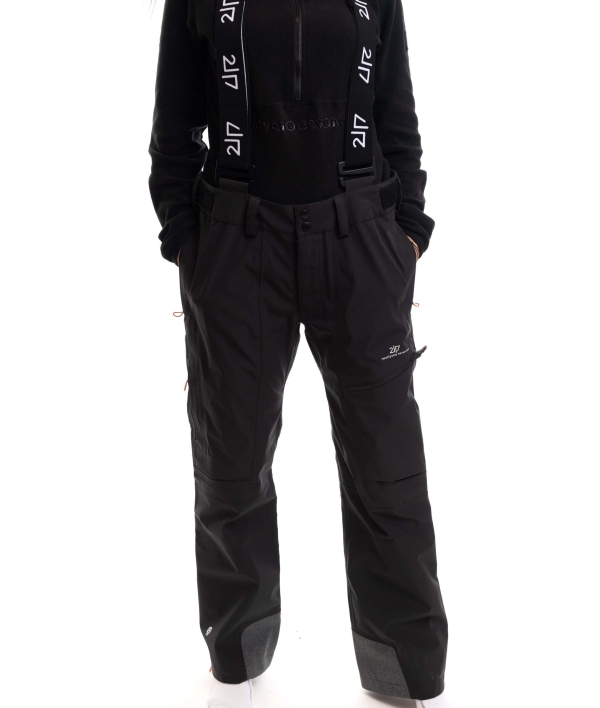 woman wearing black 3 layer ski pants